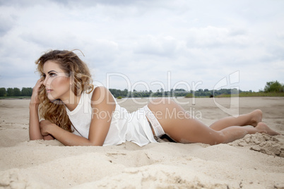 beautiful brunette woman on the beach