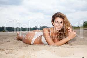 beautiful brunette woman on the beach