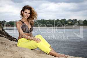 beautiful brunette woman on the beach