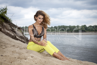 beautiful brunette woman on the beach