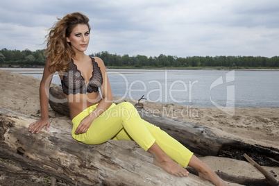 beautiful brunette woman on the beach