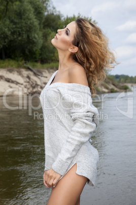 beautiful brunette woman on the beach