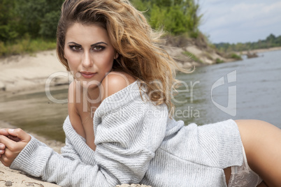 beautiful brunette woman on the beach