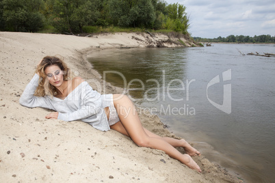 beautiful brunette woman on the beach