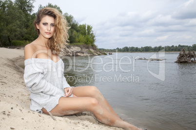 beautiful brunette woman on the beach