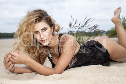 beautiful brunette woman on the beach