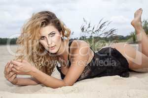 beautiful brunette woman on the beach