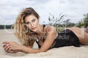 beautiful brunette woman on the beach