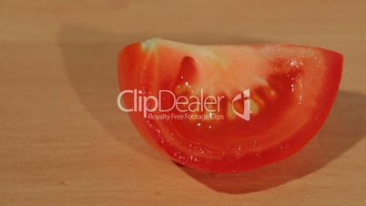 A tomato slice on a table