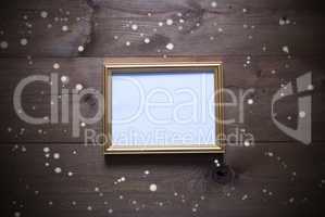 Golden Picture Frame With Copy Space And Snowflakes
