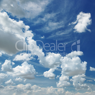 white fluffy clouds on sky