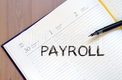 Payroll write on notebook