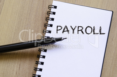 Payroll write on notebook