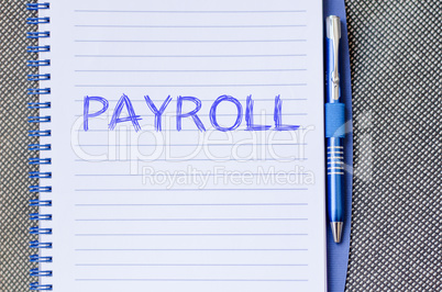 Payroll write on notebook