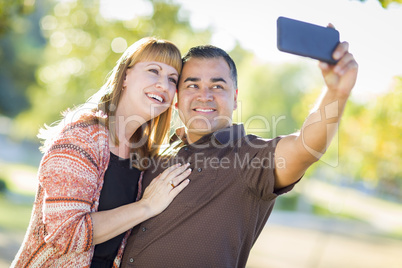 Attractive Mixed Race Couple Taking Self Portraits