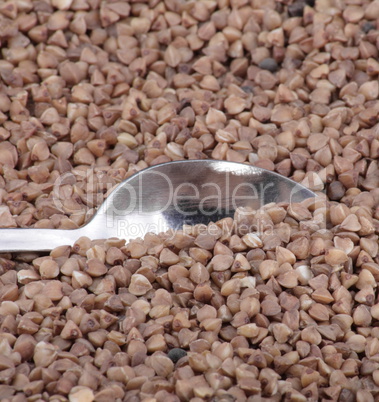 buckwheat background and teaspoon