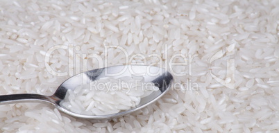 rice food background and teaspoon