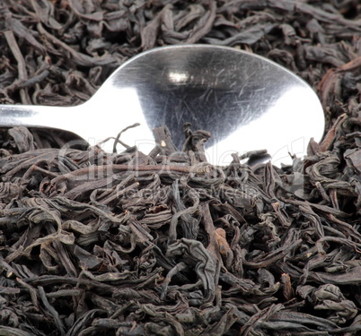 black tee and teaspoon