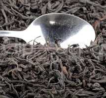 black tee and teaspoon