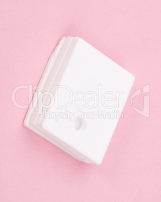 ceramic insulator on Pink Background