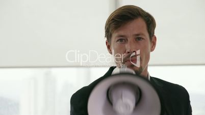 13 White Collar Office Worker Talking With Megaphone At Camera