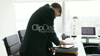 28 Portrait Of White Collar Worker With Tablet PC In Office