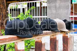 Helmets  jockey on a wooden stand