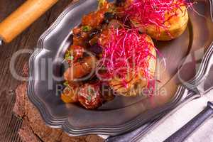 ratatouille with baked potato and beetroot sprouts