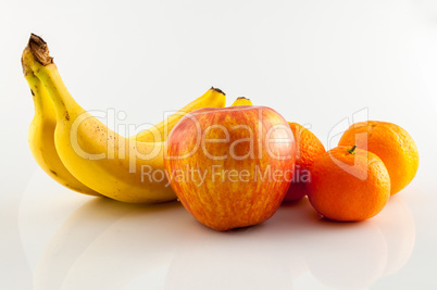 Banana, apple and tangerine