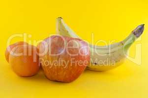 Banana, apple and tangerine