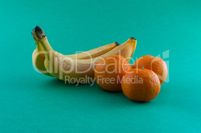 Banana, apple and tangerine