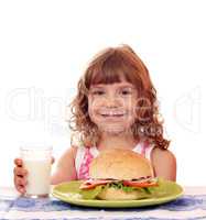 besmear little girl with big sandwich