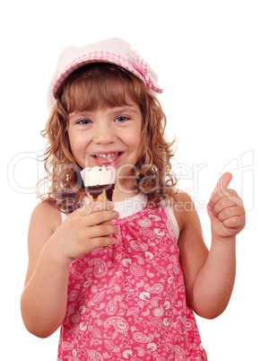 happy little girl with ice cream and thumb up