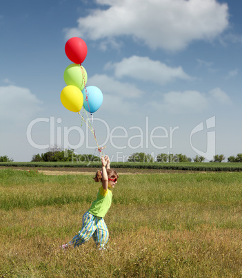 little girl running with colorful balloons