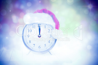 Composite image of christmas clock