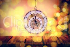 Composite image of hanging pocketwatch