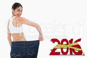 Composite image of rear view of a happy woman who lost a lot of