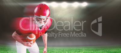 Composite image of portrait of focused american football player being ready to attack