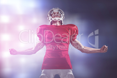 Composite image of aggressive american football player in red je