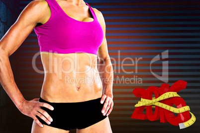 Composite image of female bodybuilder posing with hands on hips