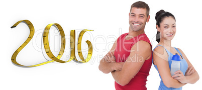 Composite image of fit man and woman smiling at camera together