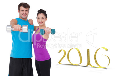 Composite image of fit man and woman lifting dumbbells