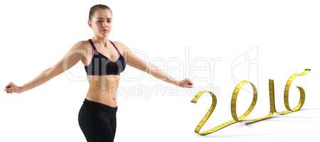 Composite image of fit brunette stretching and looking at camera