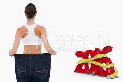 Composite image of rear view of a woman who lost a lot of weight