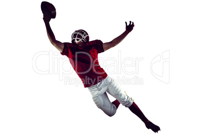 American football player scoring a touchdown