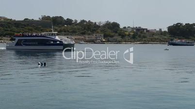 The cruise yacht with tourists, Sliema, Malta