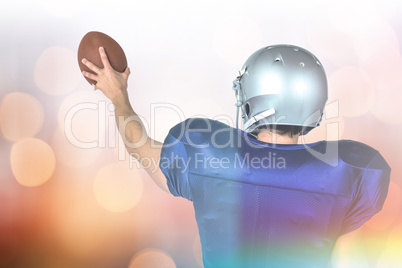 Composite image of sports player holding ball