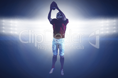 Composite image of american football player catching football