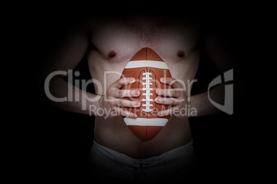 Composite image of shirtless american football player holding a