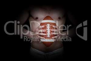 Composite image of shirtless american football player holding a